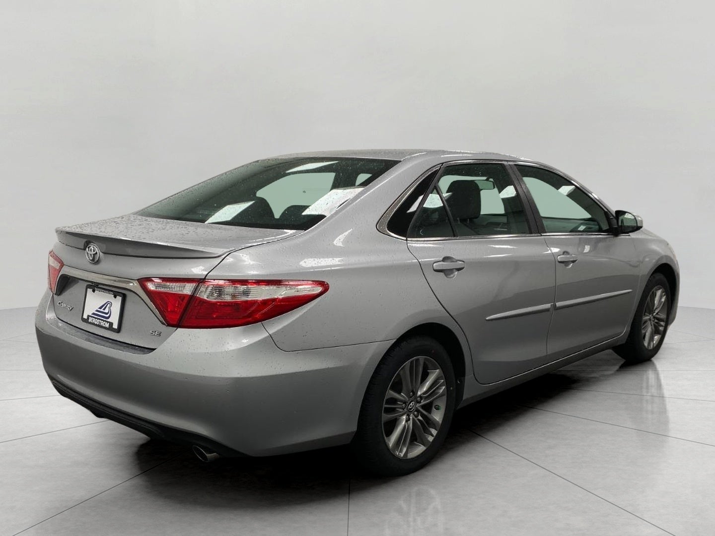 2017 Toyota Camry — rear three-quarter view