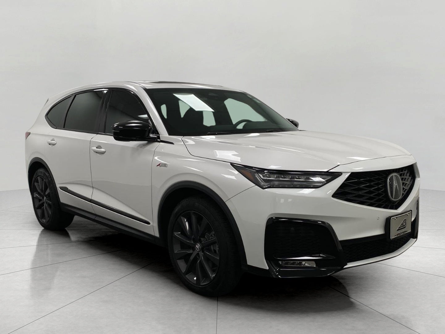 2025 Acura MDX SH-AWD w/A-Spec Package in Platinum White Pearl — front three-quarter view