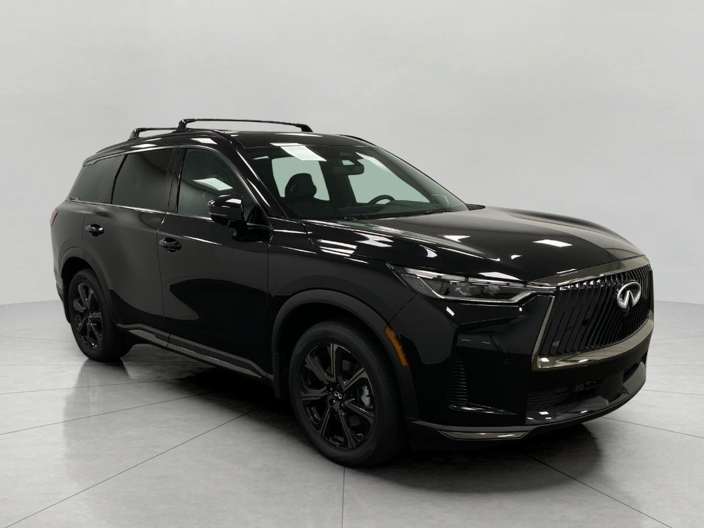 2027 INFINITI QX60 AUTOGRAPH AWD in Mineral Black — front three-quarter view