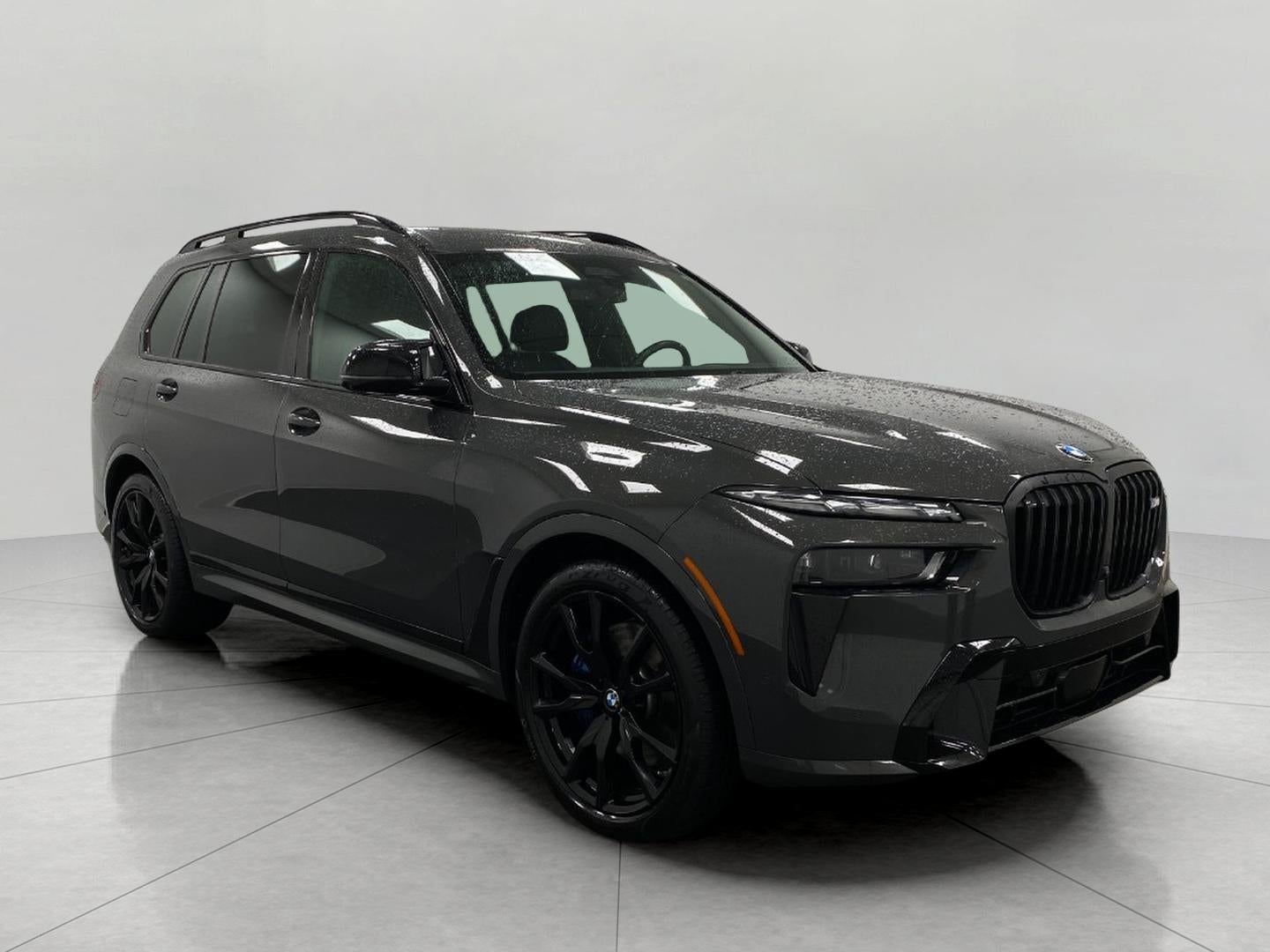 2025 BMW X7 M60i Sports Activity Vehicle in Dravit Grey Metallic — front three-quarter view
