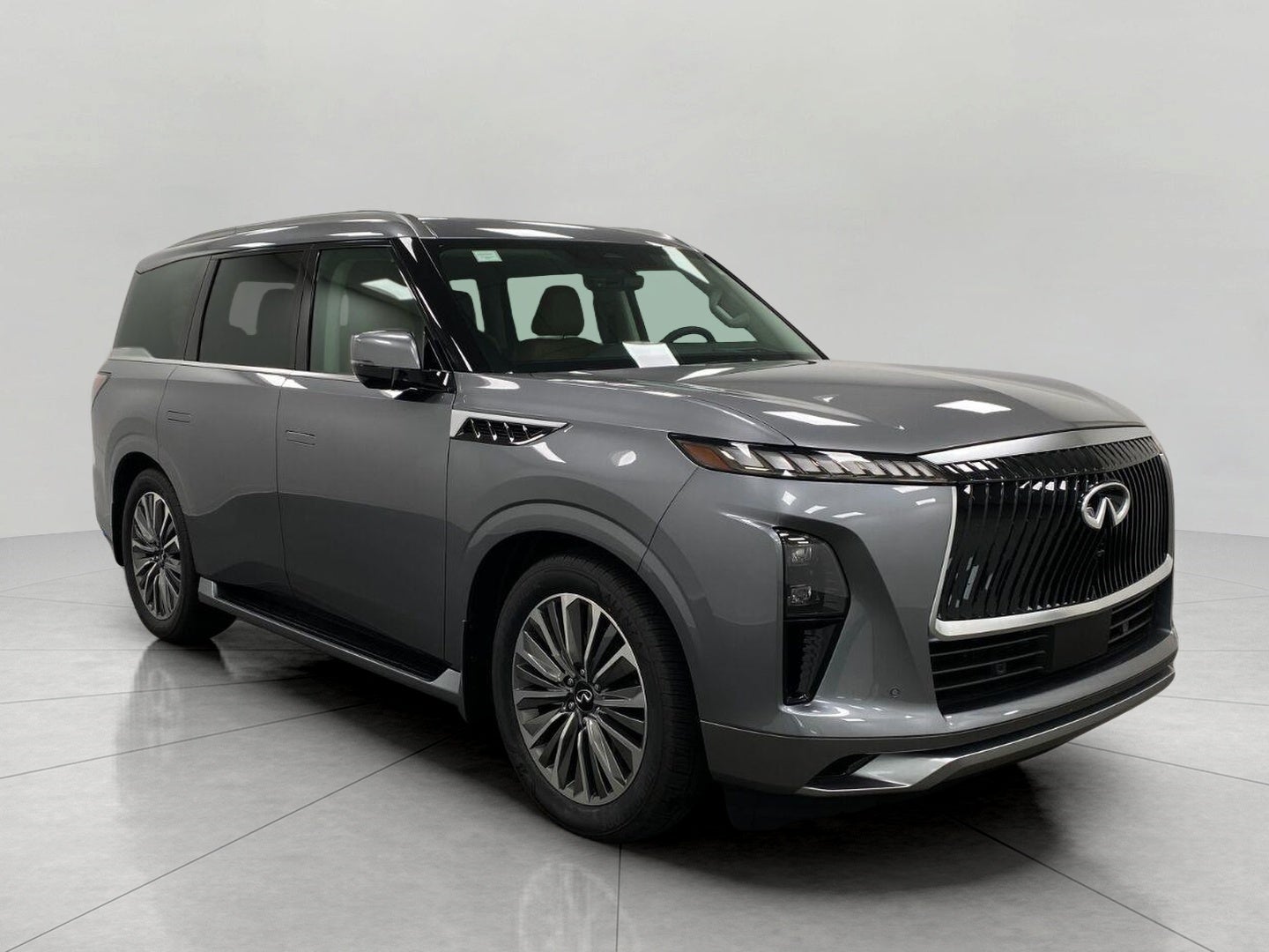 2027 INFINITI QX80 LUXE AWD in Dynamic Metal — front three-quarter view